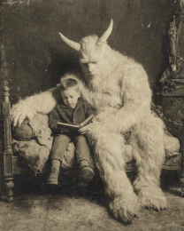 Cryptid Reading to Young Boy